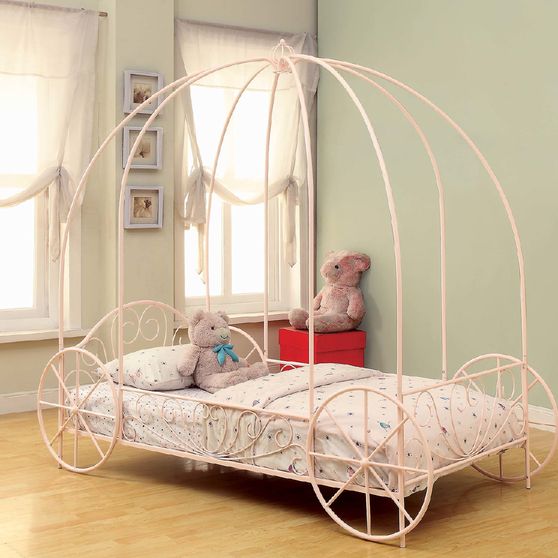 Pink twin canopy bed for a girl