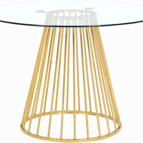 Round glass top / gold base dining table
