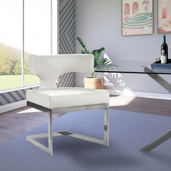Floating silver base / white leather curved back dining chair
