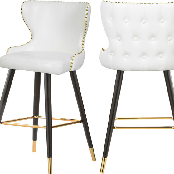 Stylish bar stool w/ golden trim and leg tips