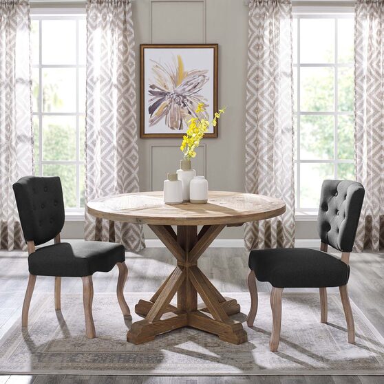 Round pine wood dining table in brown