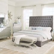 Grey upholstered king bed w high tufted headboard main photo