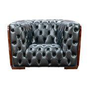 Deeply tufted custom made gray leather chair