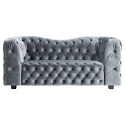 Grey velvet loveseat with tufted seats and back main photo