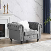 Gray velvet chesterfield classic chair with pillow in white main photo