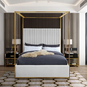 White leather channel tufted brushed brass canopy king bed