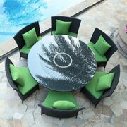 Black 7-piece rattan outdoor dining set with green cushions