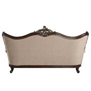 Light brown linen & cherry finish upholstery detailed carvings sofa by Acme additional picture 7