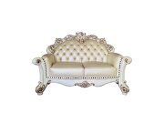 Champagne pu & antique pearl finsih button tufted loveseat additional photo 3 of 3