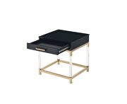 Table top in a rich black and metal frame in gold finish coffee table by Acme additional picture 8
