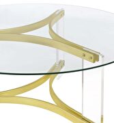 Round glass top coffee table with acrylic legs clear and matte brass by Coaster additional picture 3