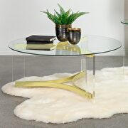Round glass top coffee table with acrylic legs clear and matte brass by Coaster additional picture 9