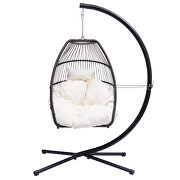 Rattan swing hammock egg chair with beige cushion and pillow additional photo 4 of 12
