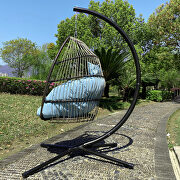 Rattan swing hammock egg chair with blue cushion and pillow additional photo 2 of 14