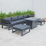 Black cushions 7-piece patio ottoman sectional and fire pit table black aluminum by Leisure Mod additional picture 8