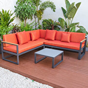 Orange cushions and black base sectional with adjustable headrest & coffee table by Leisure Mod additional picture 3