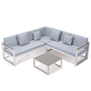Light gray cushions and white base sectional with adjustable headrest & coffee table by Leisure Mod additional picture 2