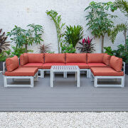 Orange finish cushions 7-piece patio sectional and coffee table set in weathered gray aluminum by Leisure Mod additional picture 2