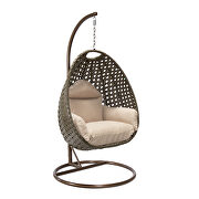 Beige cushion wicker hanging egg swing chair by Leisure Mod additional picture 2