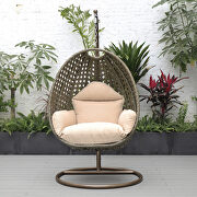 Beige cushion wicker hanging egg swing chair by Leisure Mod additional picture 4