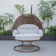 Light gray cushion and dark brown wicker hanging 2 person egg swing chair by Leisure Mod additional picture 4