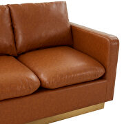 Modern style upholstered cognac tan leather loveseat with gold frame additional photo 4 of 6