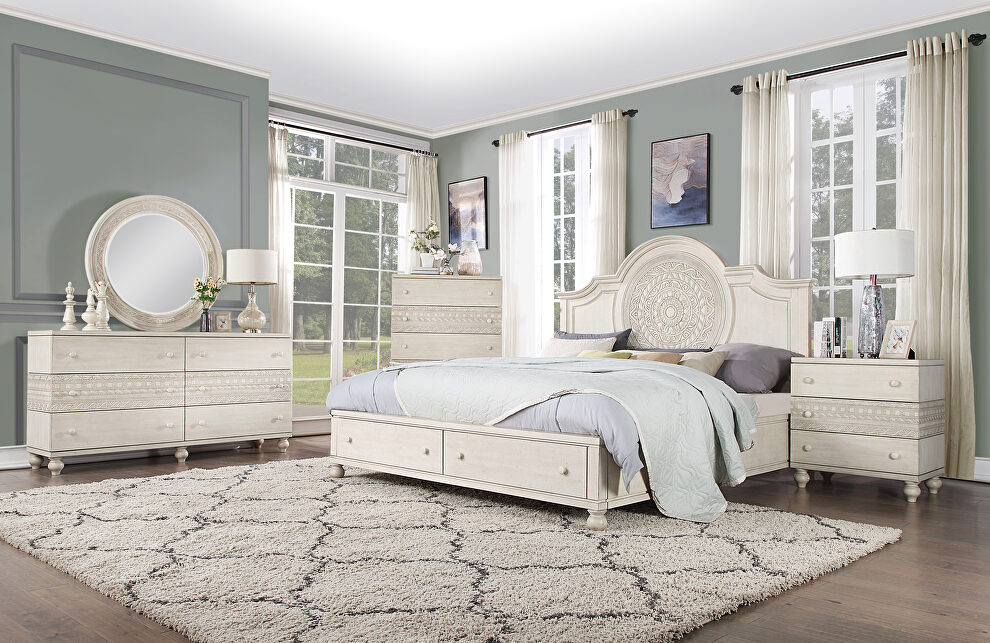Wooden-crafted frame shown in an antique white finish queen bed by Acme