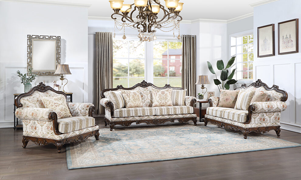 Pattern fabric upholstery & walnut finish base scrolled floral sofa by Acme