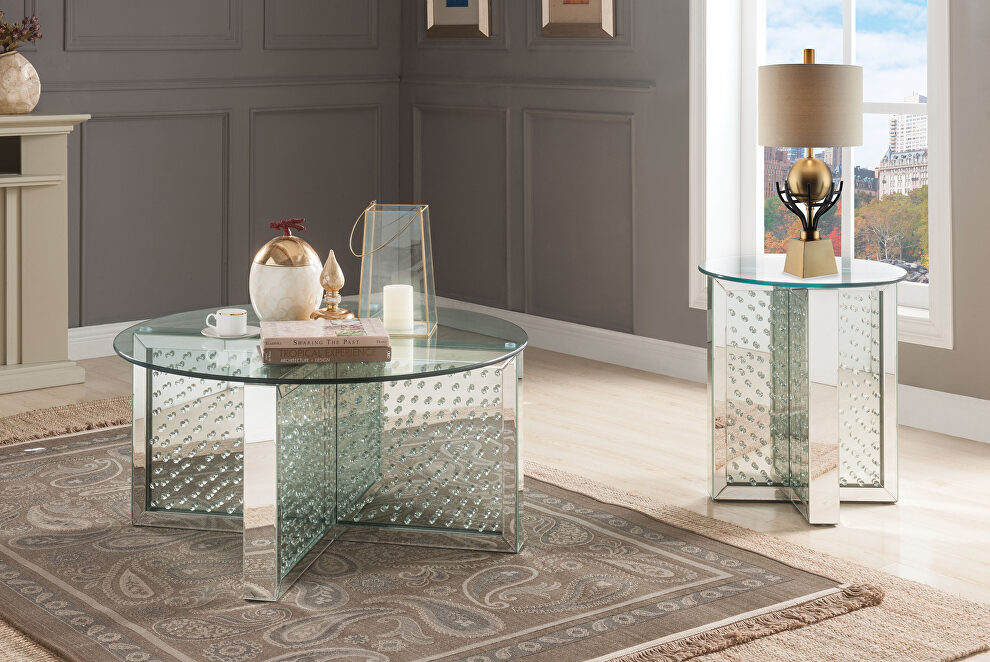 Crossed mirrored panel base round glass top coffee table by Acme