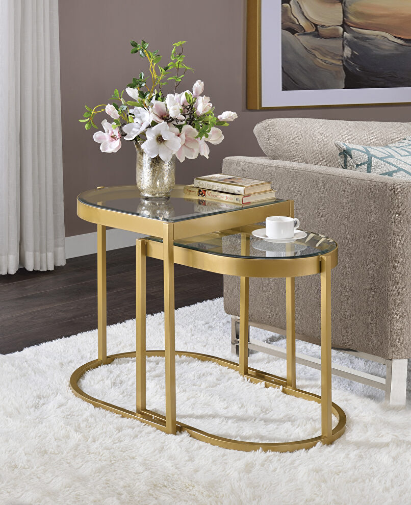 Oval shaped clear glass top/ alluring gold finish coffee table (2pc) by Acme