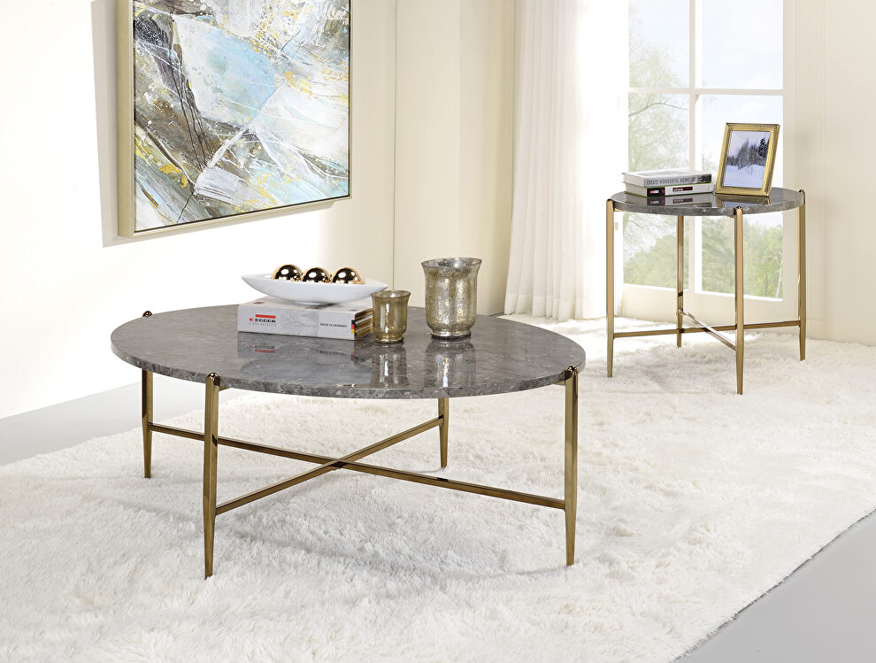 Faux marble top and champagne finish base coffee table by Acme