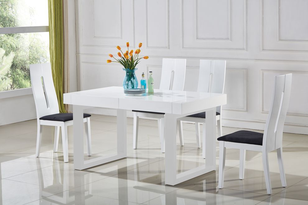 White laquered dining table w/ butterfly extension by At Home USA