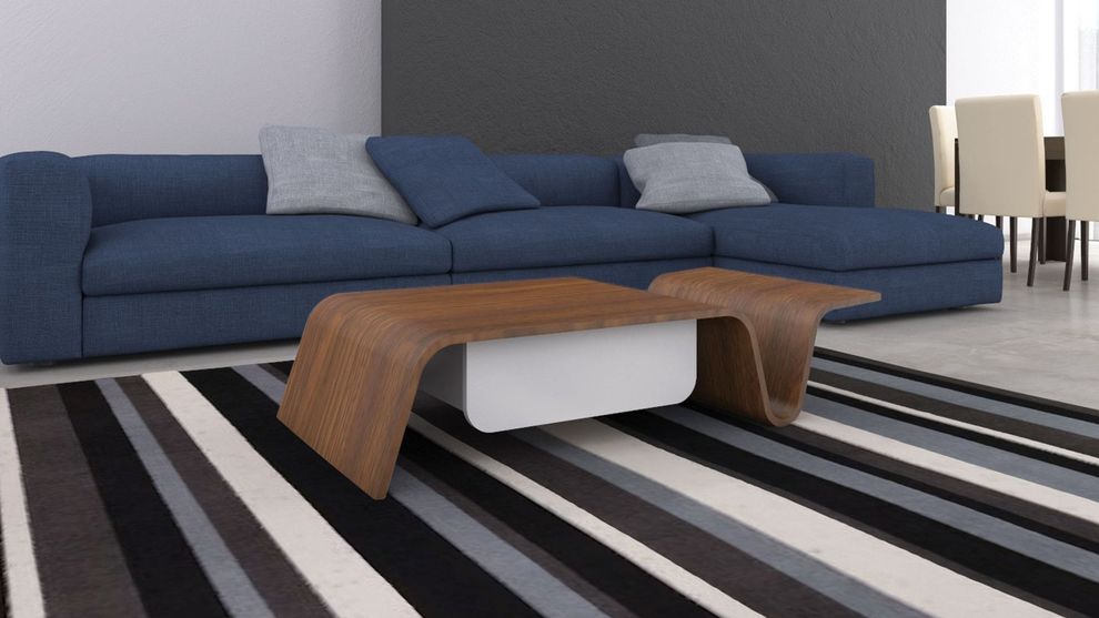 Modern curved wood base coffee table by At Home USA