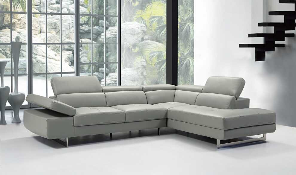 Light gray leather contemporary sectional w/ moving headrests by Beverly Hills