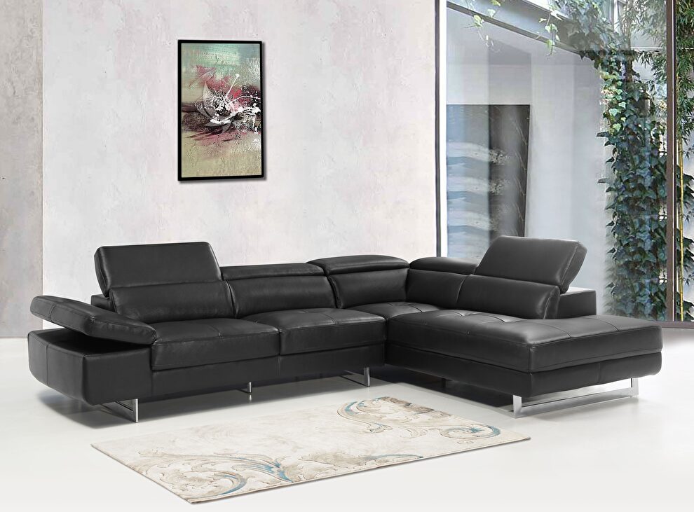 Black leather right facing sectional w/ moving headrests by Beverly Hills