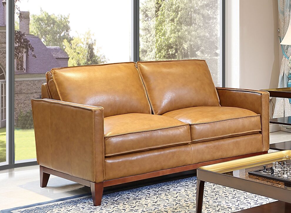 Saddle color leather casual style loveseat by Beverly Hills