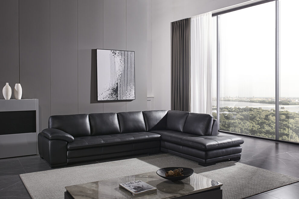 Right-facing black leather low-profile contemporary sectional by Beverly Hills