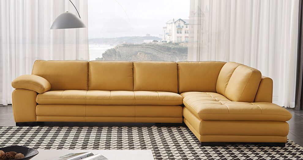 Right-facing yellow leather low-profile contemporary sectional by Beverly Hills