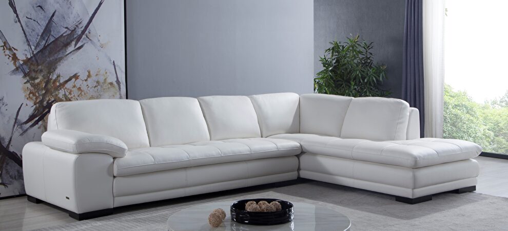 Right-facing white leather low-profile modern sectional by Beverly Hills