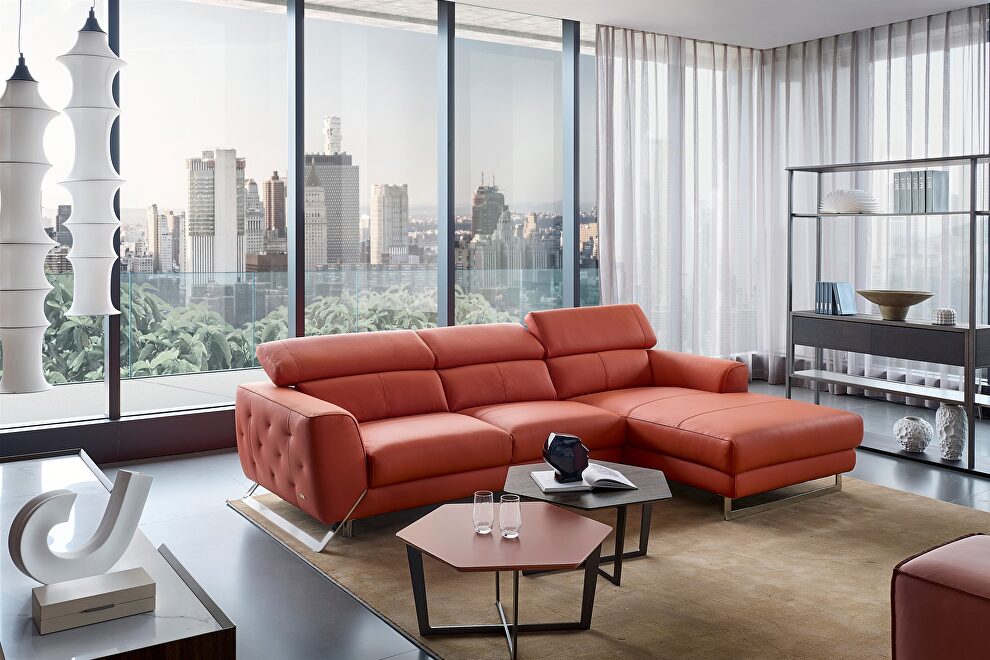 Motion headrests right-facing orange leather sectional sofa by Beverly Hills