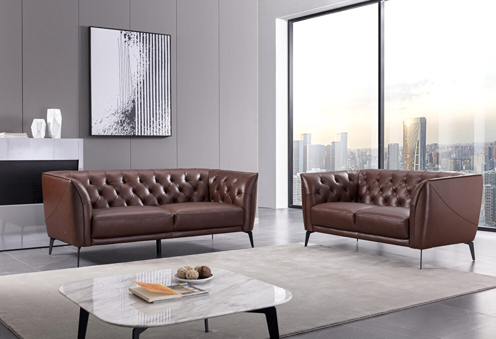 Brown leather tufted back sofa by Beverly Hills