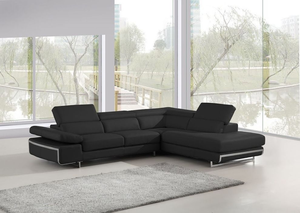 Motion headrests black sectional w/ steel legs by Beverly Hills