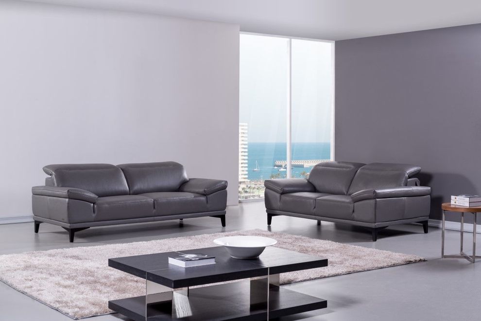 Gray modern low-profile sofa w/ adjustable headrests by Beverly Hills