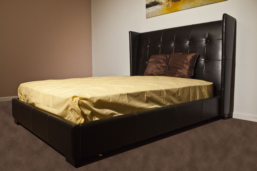 Brown bycast leather bed w/ wing design hb by Beverly Hills