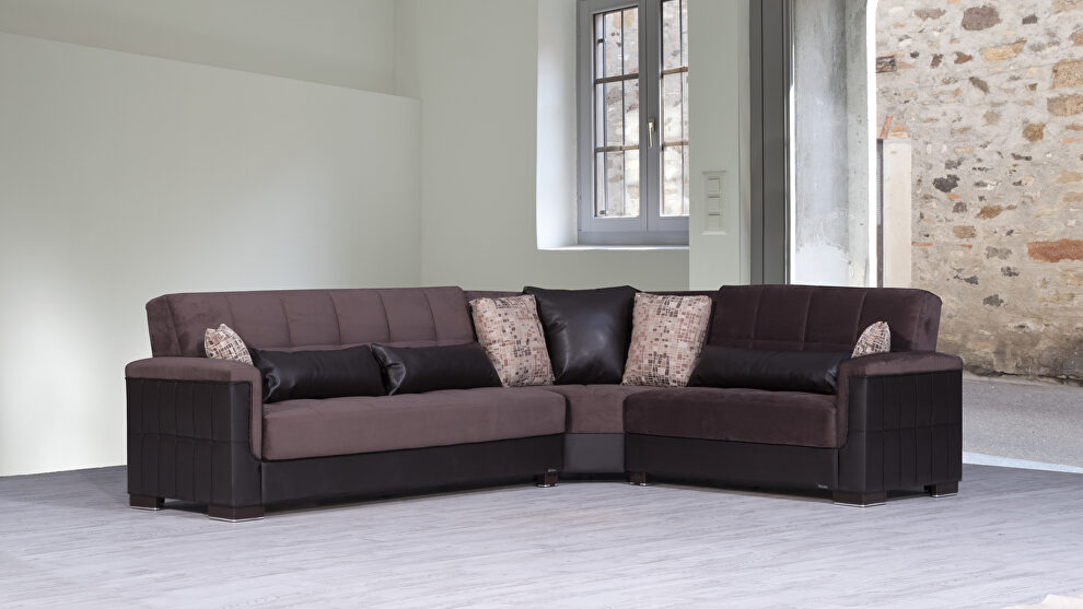 Fully reversible chocolate fabric / brown leather sectional by Casamode