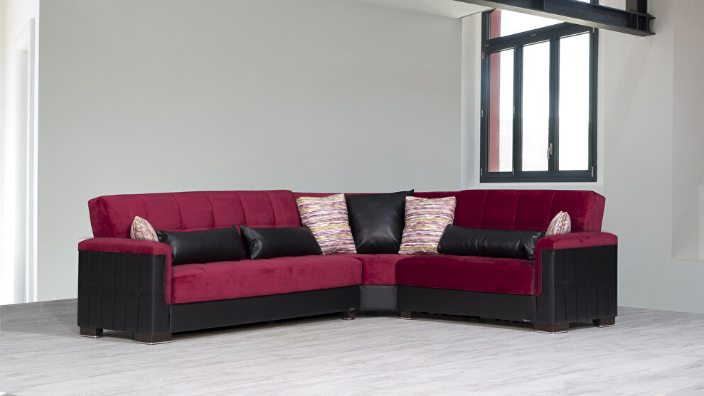 Fully reversible burgundy fabric / black leather sectional by Casamode