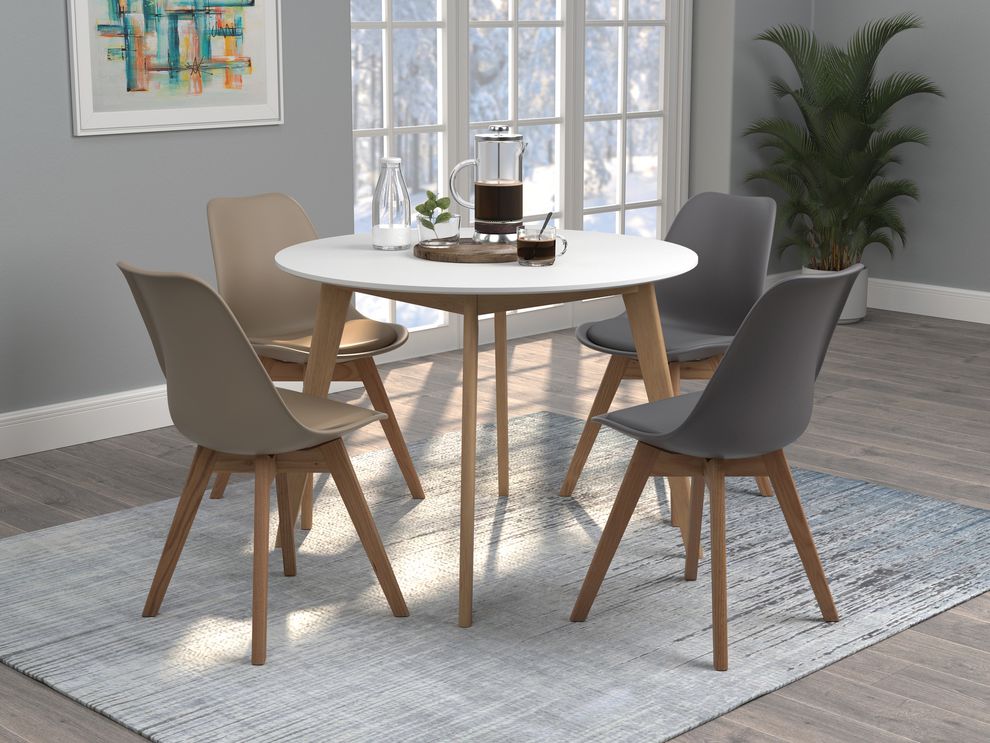 Round white dining table by Coaster