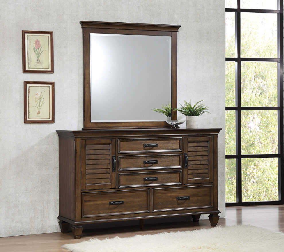 Burnished oak five-drawer dresser with two louvered doors by Coaster