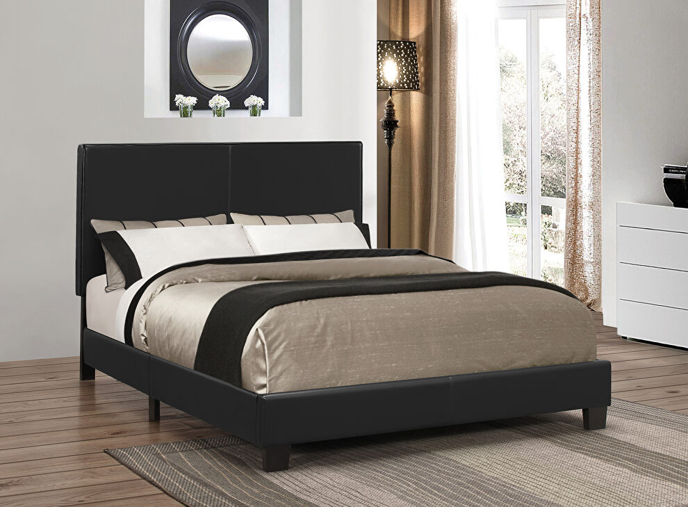 Upholstered platform black queen bed by Coaster