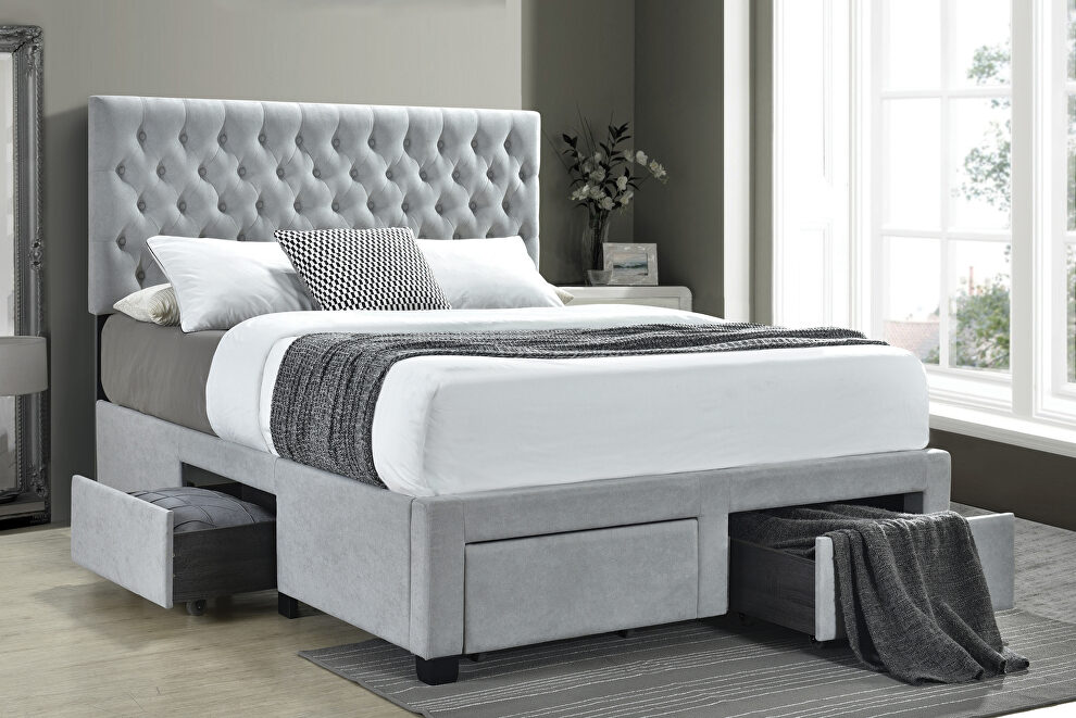 E king storage bed upholstered in a light gray fabric by Coaster